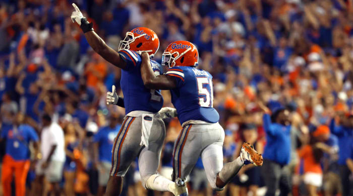 Florida Gators linebacker Amari Burney (2) celebrates with linebacker Ventrell Miller (51) after he intercepted the ball against the Utah Utes during the second half at Steve Spurrier-Florida Field.